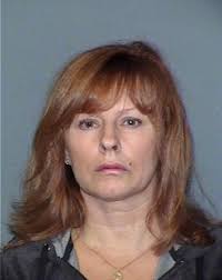 Prosecutor: Chief's wife shot twice at cops