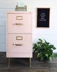 Once painted, an old metal cabinet can look brand new. 12 Fabulous Filing Cabinet Makeovers The Budget Decorator