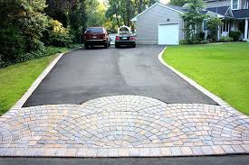 Asphalt Concrete Or Pavers Which Driveway Is Right For You Cobblestone Driveway Asphalt Driveway Paver Driveway