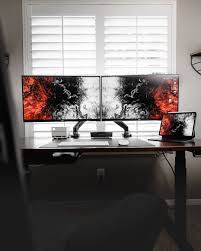 This stand easily holds two monitors on both arms instead of keeping the monitors on. A Dual Monitor Rig Can Still Be Minimal Setups Cult Of Mac