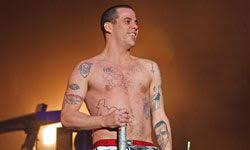 The tat reads, yeah dude, i rock!. 10 Celebrity Tattoos We Just Don T Get Howstuffworks