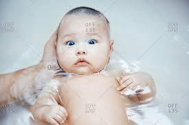 However, sometimes the baby may only dread an unpleasant experience he might have had previously, like soap getting in his eyes or his ears filling with water. Father Bath Baby Stock Photos Offset