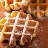 A restaurant serving of belgian waffles topped with whipped cream and syrup can have as many as 530 calories. 1