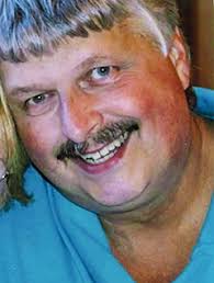 Greg L. "Greg" Arsenault