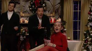 Miley Cyrus Performed A Revised Version Of Santa Baby Youtube