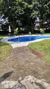 Pool Deck With Walk To Patio Paver Pooldeck Belgard Dublincobble Sable Concrete Patio Outdoor Living Pool Deck