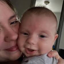 How can I get my 3-month-old baby to sleep through the night?