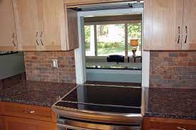 A pass through in the kitchen is an opening in the wall that allows one to pass food into another room, usually the dining room or living area. Pass Through Window Between Kitchen And Living Room After Traditional Kitchen Minneapolis By Bridgewater Houzz