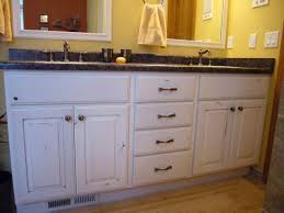 Knotty Alder Painted Vanity Gives A Rustic Feel White Bathroom Cabinets Interior Design Kitchen Painted Vanity