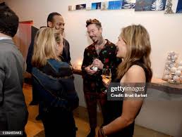 Theresa Caputo and Robert Latorre attend the Discovery, Inc. Holiday...  News Photo