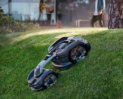 Husqvarna S Latest Robotic Lawn Mower Is Alexa Enabled And Expensive Robotic Lawn Mower Best Lawn Mower Lawn Mower