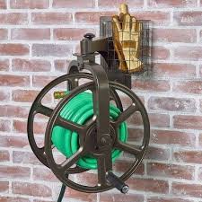 Liberty Garden Single Arm Navigator Rotating Garden Hose Reel W Storage Basket Garden Hose Reel Hose Reel Garden Hose