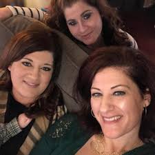 Can you identify the baby sister in this picture?