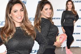 In order to divert traffic, the crossing guard had to carry a sign with her. Booby Kelly Brook Flaunts Her Famous Assets Diverting Everyone S Attention As She Promotes New Shoes Irish Mirror Online