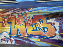 Spider man into the spider verse graffiti scene. Spider Man Ride Easter Eggs At Disneyland S New Avengers Campus