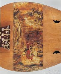 乐器 唐 枫苏芳染螺钿槽琵琶 此琵琶正面弹拨处绘有胡人和唐人骑着白象演奏音乐的 骑象胡乐图 做工 画工非常高超 从绘画样式和风格上看为中国唐朝时期制作的乐器 目前藏