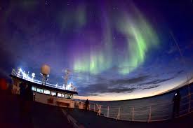 Spell and check your pronunciation of aurora. Under The Northern Lights Of Greenland