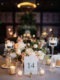 Winter wedding centerpiece flowers is a part of 25+ awesome winter wedding centerpieces for amazing wedding ideas pictures gallery. 49 Winter Wedding Centerpieces That Celebrate The Season