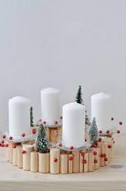 Modern minimalist advent wreath made of oak and copper plus table candle white and mini fir candle holder wood. Diy Instructions For A Festive Wood Advent Wreath Advent Wreath Diy Advent Wreath Ideas Christmas Advent Wreath
