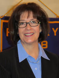 At the September 5 meeting, Dan Clark recognized Jayne Salisbury as a  multiple Paul Harris Fellow presenting her with a level 4 Paul Harris  Fellow pin. Also during the meeting, Judy Chan