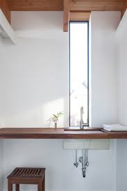 Slot Window At Bathroom Sink Phinney Ridge Residence Graham Baba Architecture Bathroom Interior Design Sweet Home Style Modern Interior