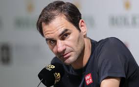 Roger Federer clashes with journo and umpire as he's sent packing in  Shanghai