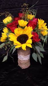 Sunflowers And Red Rose Centerpiece With Burlap And Lace Red Roses And Sunflowers Sunflowers And Roses Sunflower Wedding Bouquet
