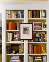 If you've got really tall coffee table books (or, hey,. How To Dress A Bookcase