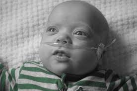 Remember baby Banks from our holiday commercial? Look how much he has  grown! He has been home for almost a month now and is 8 lbs., 11 oz. and  thriving! We are