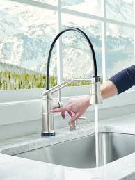 twist on pull down faucet design for