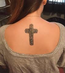 Elaborate and intricate, this cross with wings tattoo has a rising sun background which denotes hope, and remembrance of a loved soul. 125 Best Cross Tattoos You Can Try Meanings Wild Tattoo Art