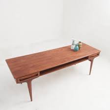 For a natural take, opt for wood, or go with brass, chrome or gold to bring some shine to the space. Danish Mid Century Coffee Table In Teak With Two Drawers A Magazine Shelf 90651