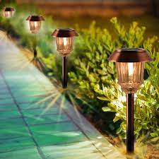 Solar garden lights come in a variety of fanciful designs intended to highlight your plant life during the night and act as an accessory at daytime. Solar Lights Pathway Solar Pathway Lights 4 Pack Solar Garden Lights Led Landscape Lighting Outdoor Decor Ip65 Waterproof 8 10 Hrs 10 40 Lm Dimmable Warm White Led Solar Path Lights For Garden Amazon Com