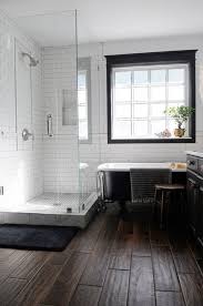 A storied style, antique wallpaper, bathroom, claw foot shower stall, clawfoot stall, custom glass enclosure, lacquered yellow chest, picture to ponder, small bathroom ideas, strom plumbing, terry cloth chair. Choosing A Shower Enclosure For The Bathroom
