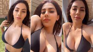 Nikki Tamboli Flaunts Her Boobs As She Gets Sunkissed While Posing in Black  Bikini (Watch Video) 