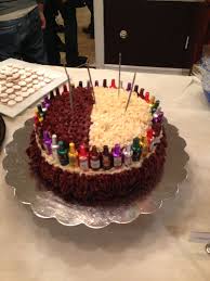 Birthday Cake Design For Brother In Law Birthday Cake For My Brother In Law Decorated With Mini Chocolate Liquor Bottles And Sparklers On Top Candy Gifts Diy Diy Food Gifts Food Gifts