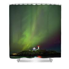 Nubble Light Aurora Art Print by Ron Risman