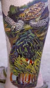 Also, they are very colorful and beautiful. Colorful Turtle And Clown Fish On Ocean Floor Leg Sleeve Tattoo Amazing Tattoo Ideas