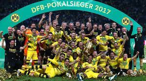 The kit was unveiled on 8 may, featuring a white shirt with a black collar, a black stripe running along the top of the sleeve and upper back, and black sleeve cuffs. Borussia Dortmund Besiegt Eintracht Frankfurt Im Dfb Pokal Finale