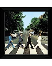 The beatles were an iconic rock band from liverpool, england that became extremely famous during the 60s. The Beatles Abbey Road Framed Album Cover
