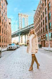 Instagram Outfits The Evolista Winter Travel Outfit New York Outfits Brooklyn Bridge New York
