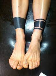 A tattoo is a form of body modification where a design is made by inserting ink, dyes, and/or pigments, either indelible or temporary, into the dermis layer of the skin.the art of making tattoos is tattooing. 2 Black Lines Tattoo Meaning Novocom Top