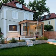 Sleek Glass And Wood House Extension With Matching Swimming Pool Read More F Tilbygninger Huse Indretning