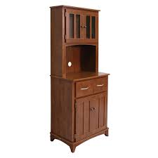 A kitchen microwave cart can normally provide a lot more functionality than just being a place to store your microwave oven. Home Source Industries Oak Hills Microwave Cabinet Bellacor