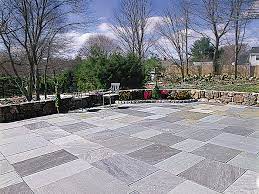 As the floor material for an outdoor dining room, lounge or firepit seating . How To Lay A Stone Patio This Old House