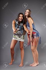 Hippie Indian Girl Making The Victory Sign, Having Fun With Girlfriend  Stock Photo, Picture and Royalty Free Image. Image 22855473.