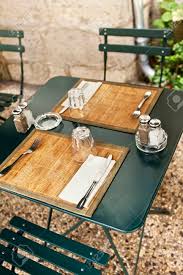 This table runner is from couleur nature Table Setting On The Terrace Of An Old French Bistro Stock Photo Picture And Royalty Free Image Image 42939634