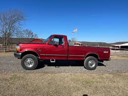 Image result for Dark Toreador Red 2000 F250