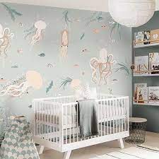 7 Ways Decorate An Ocean Themed Nursery Alphadorable Custom Nursery Art And Decor In 2021 Girl Nursery Room Baby Girl Nursery Room Ocean Baby Rooms