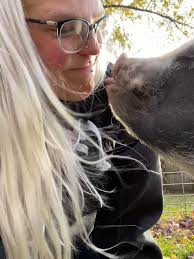 Cleaning Pearl's "poop corner" with supervision